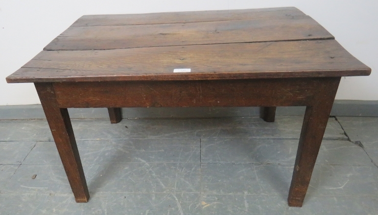 An 18th century oak country made rectangular coffee table, on tapering square inner-chamfered