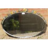 A vintage oval bevelled barbola mirror with moulded floral cornice. Condition report: Some