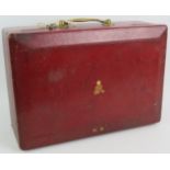 A George V British Government ministerial despatch box in red leather with gold block royal cypher