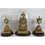 A late 19th century gilt and porcelain clock garniture by A.G. Mougin. Striking movement Number