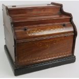 A late 19th century Celestina organette in walnut case with gilt decoration and bearing a retailer's