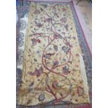 A pair of long antique wool work curtains hand embroidered in the Elizabethan style with