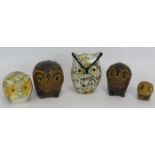 Three Hastings pottery owl figures, a Murano style glass owl and an Italian alabaster owl. Tallest