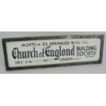 A vintage church of England building society advertising sign. Engraved letting on white glass in