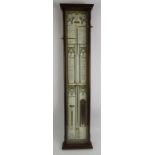 A contemporary copy of an Admiral Fitzroy barometer in mahogany case with instructions. Height 97cm.