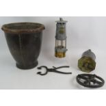 A Premier lamp and Engineering Co miner's safety lamp, a 19th century leather bucket, a John Linwood