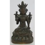 A small antique Chinese bronze Deity figure, hollow cast. Height 17cm. Condition report: Some