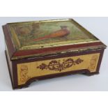 An early Huntley & Palmers biscuit tin with hinged lid featuring relief decoration of a pheasant.