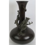 A large bronze Japanese baluster vase with a finely modelled dragon. Late Meiji period. Height 39cm.