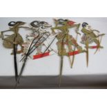 Four hand decorated Indonesian Wayang Kulit shadow puppets c1960s, each double sided and with horn