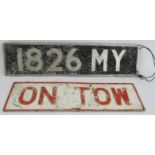 A vintage pressed aluminium car number plate 1826 MY and a similar 'on tow' plate. (2). Condition