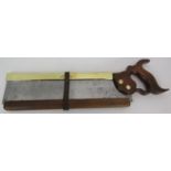 An early steel and brass Drabble & Anderson tenon saw with blade guard. Length 14" blade.