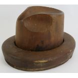 An early 20th century two part milliner's hat block stamped 'Hatters Supply House Chicago', size 6