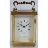 A brass cased 8 day English carriage clock by the London Clock Co. Height 14.5cm. Key present.