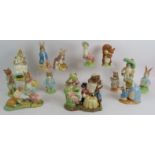 A collection of Beswick pottery limited edition Beatrix Potter figures plus a Mad Hatter's tea party