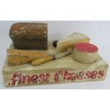 A vintage 1950s shop display cheese board constructed of hand painted wood and sign written '
