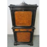 A 19th century Aesthetic Period burr walnut and ebonised music cabinet with ¾ gallery, featuring