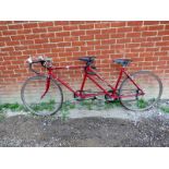 A vintage Raleigh his and hers 10-speed tandem road bike, fitted with twin leather Brooks