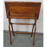 A late 19th century walnut folding campaign writing desk, the interior with inset green gilt