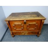 An antique painted pine Continental mule chest in the 17th century taste, with internal candle box