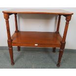 A Victorian walnut two-tier buffet on tapering turned supports. Condition report: Various minor