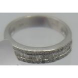 A certificated 18ct white gold three row, 57 diamond ring comprising of 34 baguette cut & 23 round