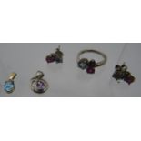 A silver ring set with three semi-precious stones and matching earrings, ring size L, a small silver