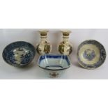 An 18th century Chinese porcelain armorial bowl, two early 19th century blue and white bowls and a