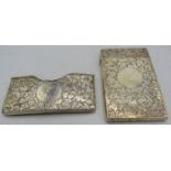 An engraved silver card case with hinged lid. Birmingham 1899 and an engraved silver pocket card