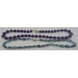 A fine quality faceted amethyst necklace with yellow metal spacers, 14ct yellow gold ball clasp
