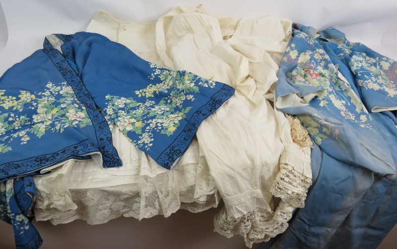 A vintage printed Kimono style robe, a similar Kimono style jacket, a cotton and lace petticoat, a
