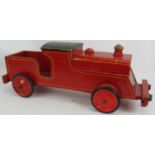 A vintage wooden Triang Loco toy train, Length: 63cm. Condition report: Front wheels are later.