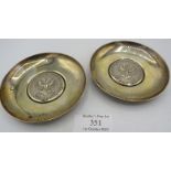 A pair of silver commemorative dishes depicting a twin headed eagle, 1672 Ch Co 1972, London 1971. 5