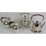 A silver plated spirit kettle and stand with rattan handle, a similar teapot and two plated Jersey