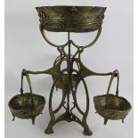 A contemporary Art Nouveau style cast bronze table centre of tripod form consisting of one large