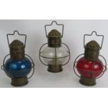 Three vintage 'Wedge' English onion ships lantern with clear, red and blue glove shaped shades and
