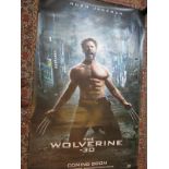 A large vinyl film poster for the movie The Wolverine in 3D. 242cm x 153cm. Condition report: Some