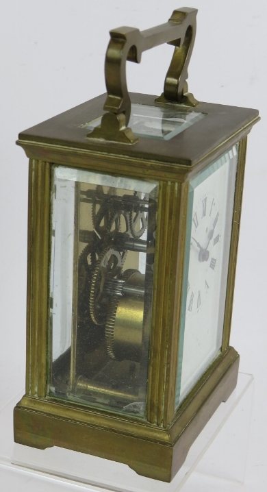 A brass cased 8 day carriage clock with white enamel dial. Key present. Height 15cm. Condition - Bild 2 aus 3