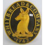 A cast alloy Whitbread & Co Brewery pub sign with a black and gilt finish. Size: 45cm x 39cm.