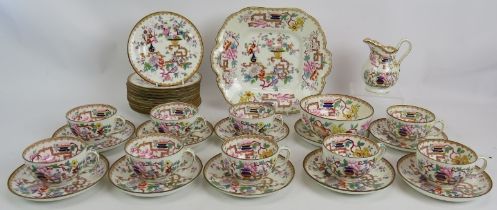 A mid 19th century Minton porcelain part tea service in tree pattern. Consisting of 9 cups, 10