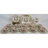 A mid 19th century Minton porcelain part tea service in tree pattern. Consisting of 9 cups, 10