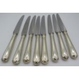 A set of silver handled dinner knives: Sheffield 1972. Condition report: Some surface scratching.