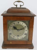 A reproduction Georgian style bracket clock with English striking and chiming movement by