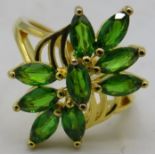 Russian diopside ring. Faceted marquise cut stones, overall 23 x 15mm setting. Ring size O.