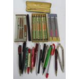 A collection of vintage propelling pens, leads and a compass. Including a rolled gold Yard-o-led