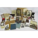 A unique collection of medals, badges, photos and ephemera relating to a father and two sons, all