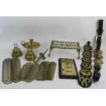 A lot of mixed brassware including a cribbage board and pegs, 2 bells, 7 fretwork finger plates,