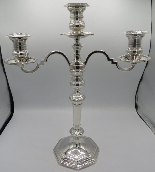 A fine solid silver three branch candelabra, Sheffield 1978, makers E.H. Approx 16" high, approx