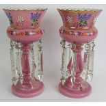 A pair of antique glass table lustres with hand decorated pink and white glass bodies and crystal