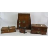 An Edwardian oak smokers cabinet with plated mounts, two similar cigar/cigarette boxes and an
